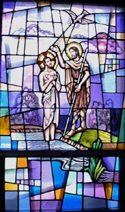 Jesus is baptized by John-the-Baptist